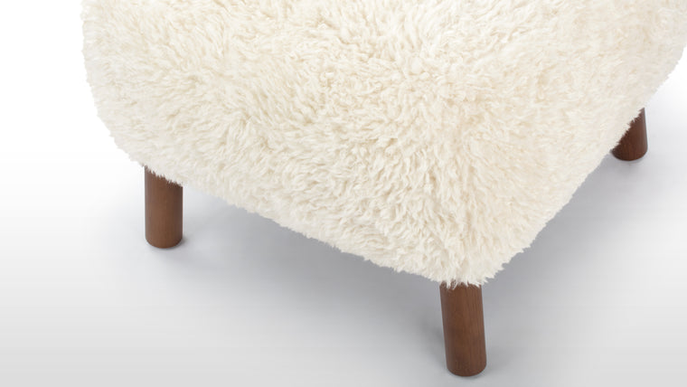 Stylish and Versatile|With a solid beech and plywood frame, the Petra is covered in HR foam and polyester wadding, and encased in Vegan Sheepskin, the Ottoman provides the ultimate cosy companion to the Lounge Chair, or as a stylish stool on its own.
