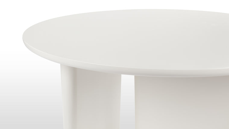 Geometric Grace | At the heart of its design, two large legs form a geometric harmony that is both visually striking and functionally sound. These substantial supports not only provide stability but also contribute to the table's overall aesthetic, embodying a perfect synthesis of form and function.
