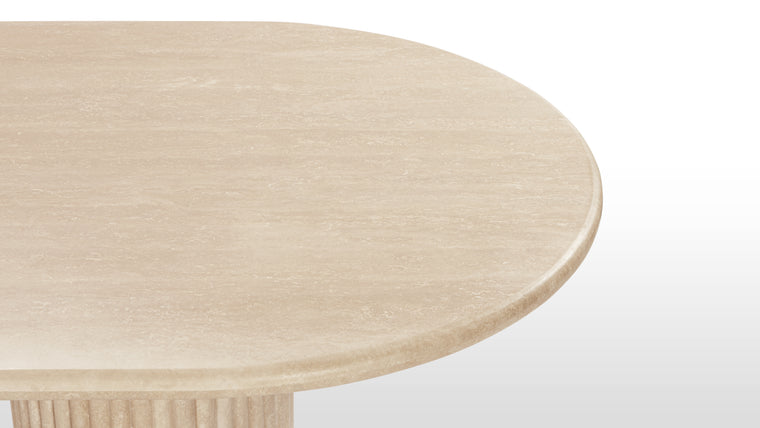  Natural Travertine | Made from honed natural Italian travertine, this beautiful contemporary table makes a stunning centrepiece. Featuring a moon-like oval top and a reeded pedestal base, it is a great choice for considered, modern homes.
