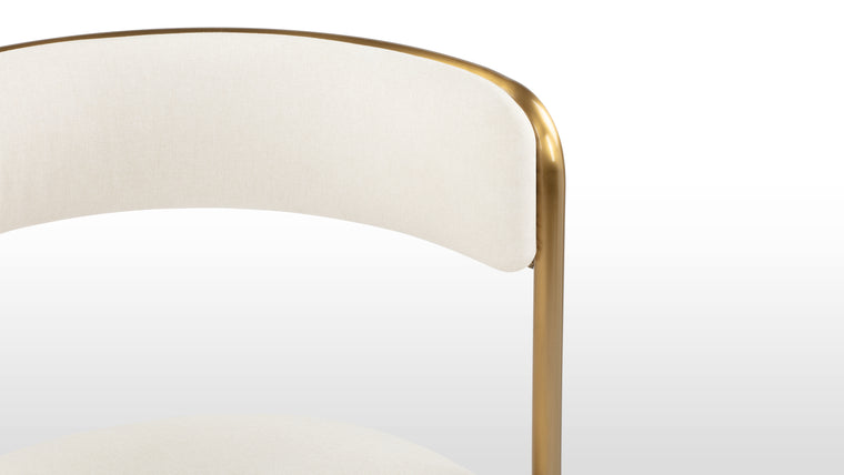 Crafted for Excellence | The allure of the Demi Bar Stool lies in its attention to detail and exquisite craftsmanship. The polished brass frame adds a touch of grandeur to any interior space. Each curve and angle is meticulously sculpted to perfection, creating a visual masterpiece that is as much a work of art as it is a functional piece of furniture.
