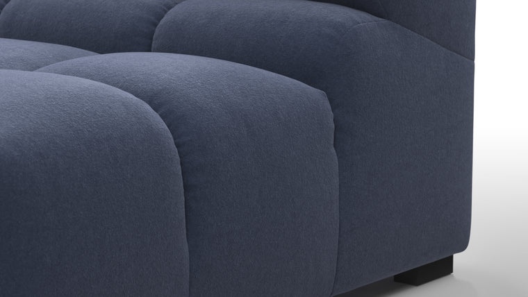 SUPERIOR COMFORT | Designed with the easy-going, informal ethos of the 1970s in mind, the Tufted modules are generously proportioned, coming together in a bench-like base with barely-there connections, allowing plenty of room for you to lean back and curl up in comfort.
