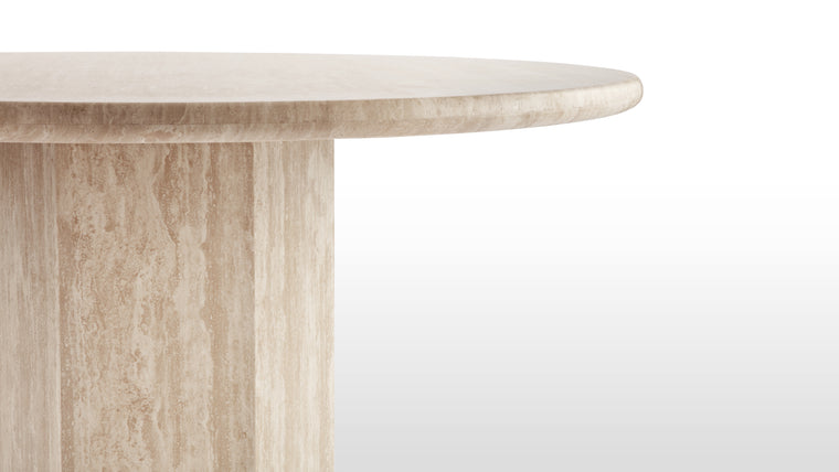 Travertine Masterpiece | Made from honed natural Italian travertine, this beautiful modern table makes a stunning centrepiece. Its simple, striking form pays homage to this luxurious material, accentuating the distinctive texture and patina.
