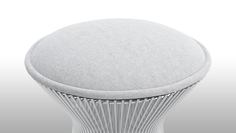 Modern Design | Wrapped in sumptuous gray wool upholstery, the Platner Stool offers a plush seating experience that invites you to relax and unwind. The natural warmth of the wool complements the modern steel base, striking a perfect balance between softness and industrial flair.

