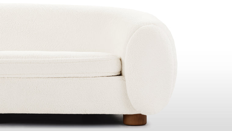 Sumptuous Sherpa | With its sumptuous cushions and soft upholstery, the Polar Bear Sofa offers a truly luxurious seating experience. The generously padded seat and backrest provide optimal support, enveloping you in a cocoon of comfort. The thoughtfully chosen sherpa fabric adds an extra layer of tactile delight and visual appeal.
