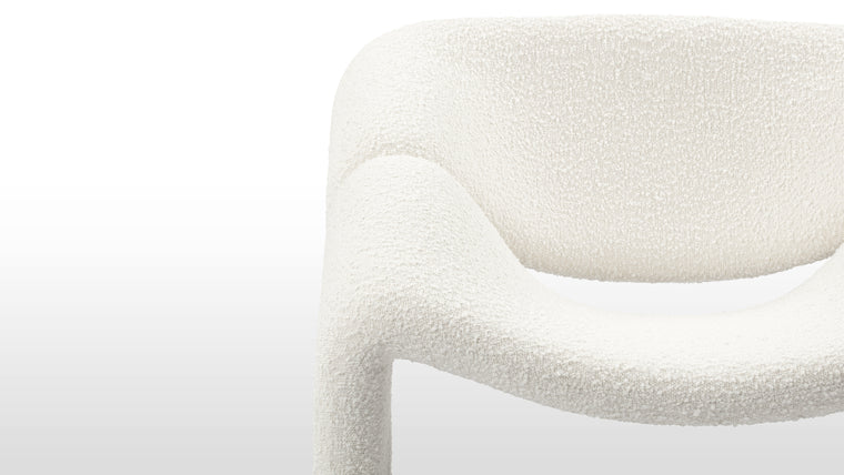 Chic Design | With its plush cushioning and enveloping design, the Groovy Chair offers a comfortable seating experience. Whether you're curling up with a good book or simply lounging and unwinding, this chair provides the perfect spot to relax and rejuvenate.
