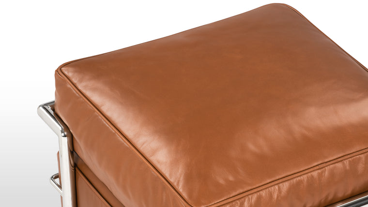 Luxurious Leather | Crafted from premium leather, the Corbusier Ottoman exudes an air of opulence. The leather's supple texture not only feels heavenly to the touch but also ages beautifully, developing a rich patina over time that tells the story of its use.
