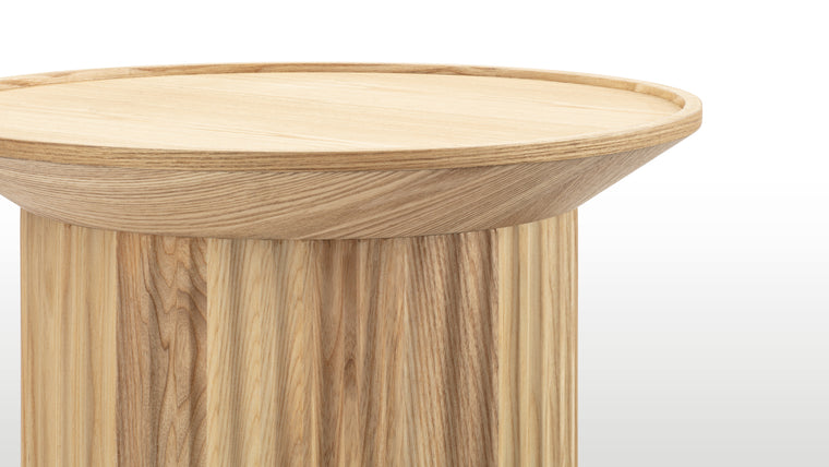 Natural Beauty | The Otto Side Tables feature a thoughtfully designed cylindrical base, meticulously crafted from premium natural wood. The wood's rich grains and textures not only add a touch of nature's beauty but also ensure the durability that comes with quality craftsmanship.
