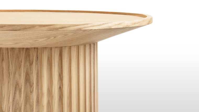 Natural Beauty | The Otto Side Tables feature a thoughtfully designed cylindrical base, meticulously crafted from premium natural wood. The wood's rich grains and textures not only add a touch of nature's beauty but also ensure the durability that comes with quality craftsmanship.
