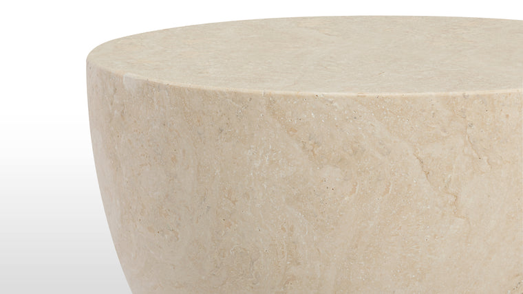 Nature's Artistry | The Apollo Side Table features a unique hourglass shape, adding a touch of elegance and sophistication to any space. Its stunning design showcases the natural beauty of travertine stone, with distinct veining and texture that make each table a one-of-a-kind masterpiece.
