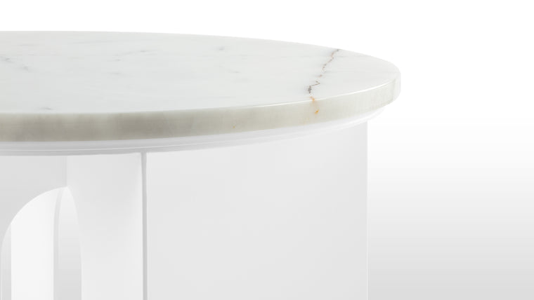 Natural Beauty | The marble tabletop of the Gianni Side Table introduces an element of opulence and refinement. Carefully selected for its quality and veining, the marble surface adds a tactile and visual richness to the table. Each slab is unique, presenting a one-of-a-kind pattern that enhances the overall aesthetic.
