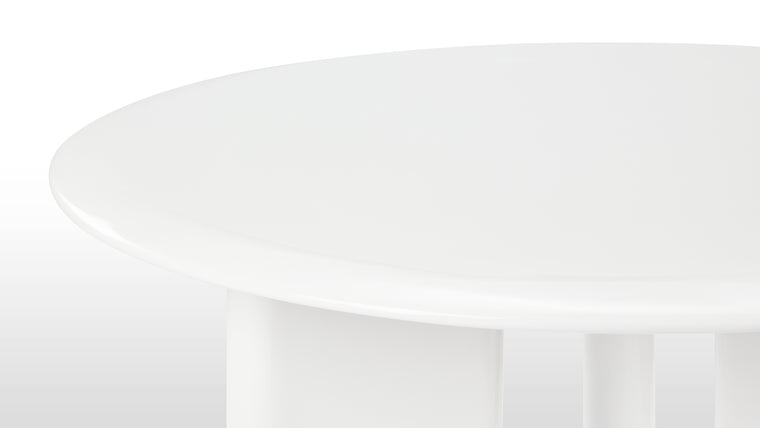 Elegance Redefined | The Estee Dining Table features a round tabletop crafted from a high-quality white fiberglass, delivering a subtle yet timeless aesthetic. The durable material ensures longevity, making it a wise investment for those who seek both beauty and resilience in their furniture.
