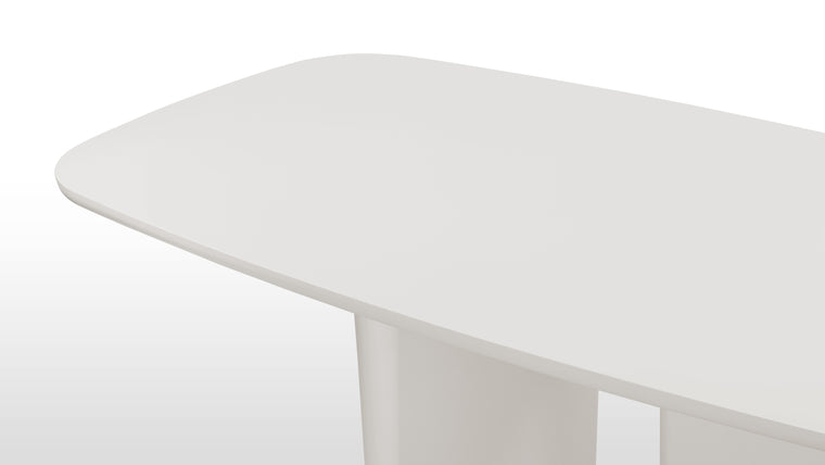 Timeless Color | Crafted from robust materials, this table blends durability with a refined white painted surface, promising a lasting piece that’s as easy to maintain as it is to admire.
