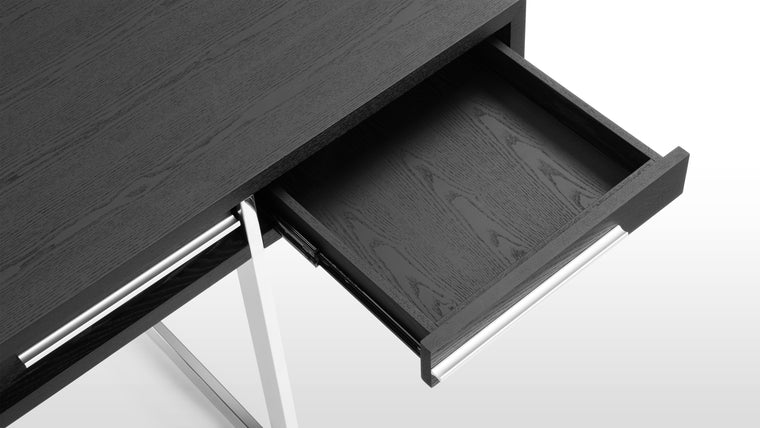 TOP TO BOTTOM | From its spacious surface to the roomy drawers, this desk gives you space for showcasing, storing, and utilizing what you love most. Keep your workspace clean, clear, and clutter-free without compromising on style.
