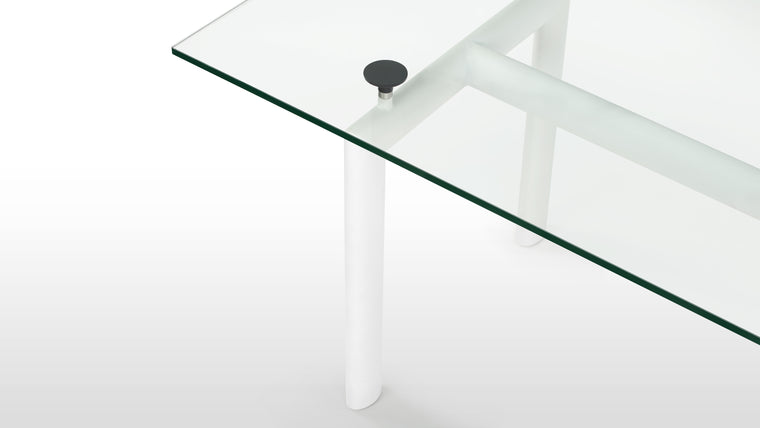 DURABLE CRAFTSMANSHIP | Built to last, this table features a robust tubular steel frame paired a high-quality tempered glass tabletop. This durability ensures that your table will serve as a lasting investment.
