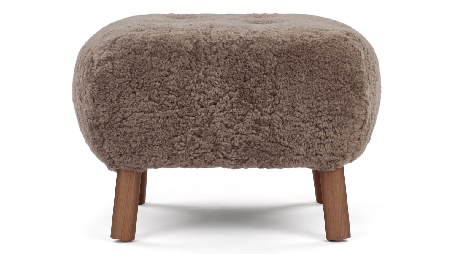 A PETITE COMPANION | Designed to complement the Petra Lounge Chair, the Petra Ottoman adds comfort and style to the cosy yet sophisticated chair. Not to be overshadowed by its predecessor, the stool is quite lovely and versatile on its own. It can be utilized as a traditional footstool or ottoman, and it’s also ideal for extra seating.
