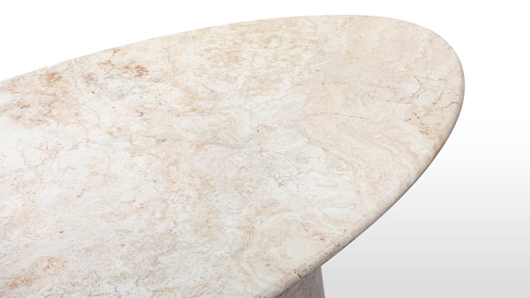 Nature’s Elegance | The table's dedication to showcasing the organic charm of travertine transforms it into more than just a dining table; it becomes a celebration of the inherent uniqueness found in the natural world.
