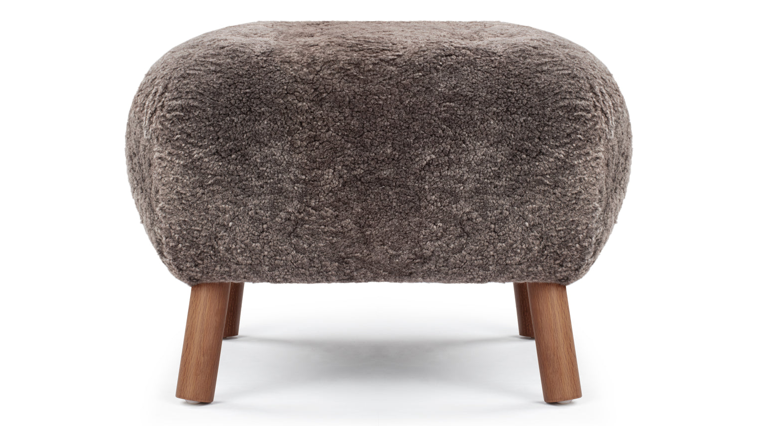 A PETITE COMPANION | Designed to complement the Petra Lounge Chair, the Petra Ottoman adds comfort and style to the cosy yet sophisticated chair. Not to be overshadowed by its predecessor, the stool is quite lovely and versatile on its own. It can be utilized as a traditional footstool or ottoman, and it’s also ideal for extra seating.
