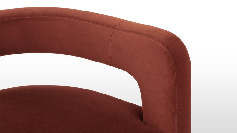 Comfort Elevated | Designed for indulgent relaxation, the Nola Lounge Chair envelops you in sumptuous comfort from every angle. The rich, velvety texture promises a tactile indulgence, while the warm, earthy hue adds a touch of warmth and allure to your home decor.
