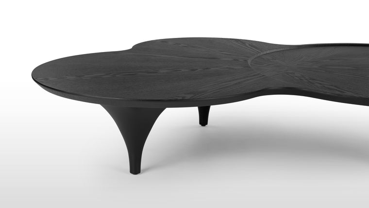 Practical Art | The Taki Coffee Table serves as both a functional coffee table and a captivating conversational piece. Its unique design and robust construction make it a versatile addition to any room, blending practicality with artistic appeal.
