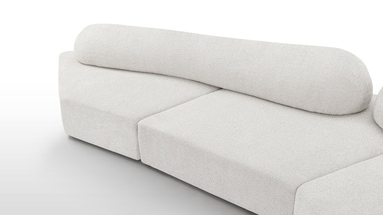 Redefining Relaxation | The cushioning of the sofa provides a unique seating experience that combines softness with support, ensuring that the sofa remains comfortable for extended periods. The sofa’s low profile and generous dimensions encourage a laid-back lounging posture, making it perfect for both casual and formal settings.
