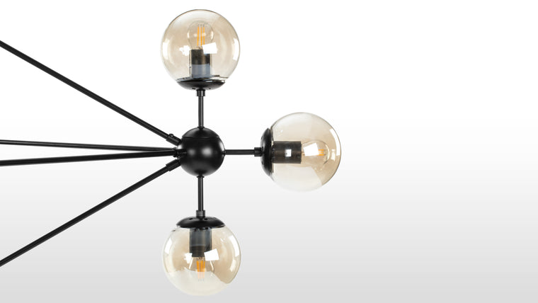 Distinctive Brilliance | The Moto Chandelier is a statement piece that adds character and personality to any space. Its timeless design, versatility, and impeccable craftsmanship make it a standout choice for those seeking sophistication and style in their interiors.
