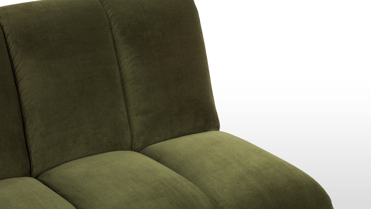 Retro Charm | Enveloped in a luxurious green velvet, this chair embraces the essence of contemporary style while paying homage to its retro roots. Its warm, unfussy design adds a welcoming charm to your home or office. Sink into its plush cushions and let the stresses of the day fade away as you relax in style and comfort.
