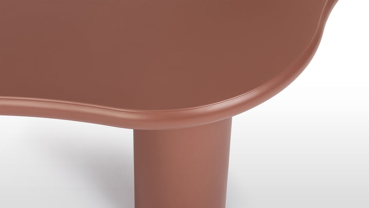 Natural Shades | The Avery Coffee Table’s unique, organically shaped surface is emphasised by colors inspired by natural materials. A matte finish ensures its shape is the table’s defining characteristic.
