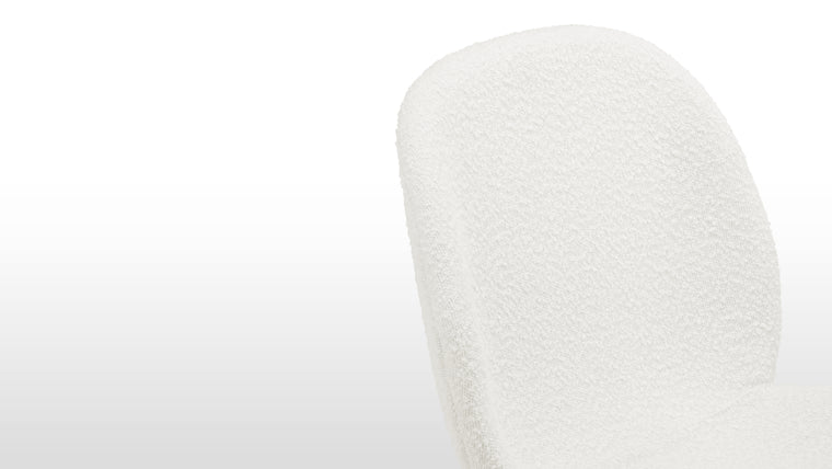 CHIC SHAPES | Curves and lines play beautifully together to create the contemporary design of this unique dining chair.
