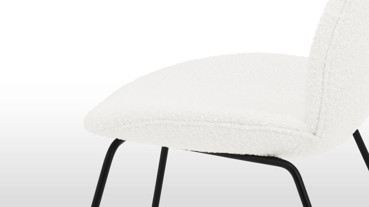 Modern Icon | The Beetle chair has garnered praise worldwide, becoming an icon of contemporary design. Available in an array of premium upholstery options.
