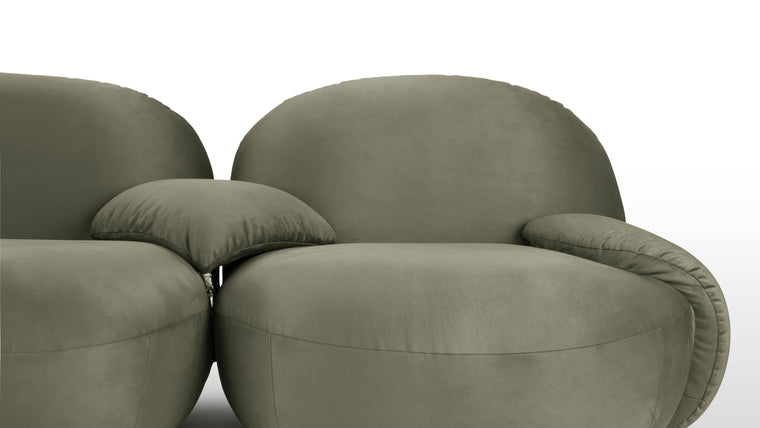 SOFT AND CURVACEOUS | Constructed with a sturdy frame and upholstered in premium materials, the Palais Sofa exudes quality craftsmanship and enduring beauty. Its graceful curves and opulent upholstery make it a stunning focal point in any room, while its ergonomic design ensures optimal support and comfort.
