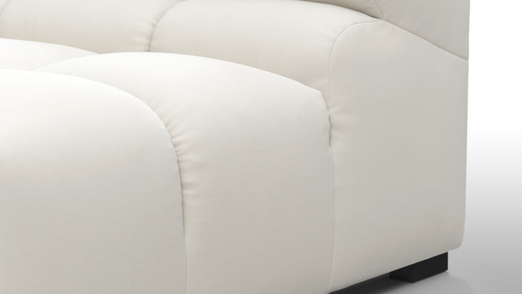 SUPERIOR COMFORT | Designed with the easy-going, informal ethos of the 1970s in mind, the Tufted modules are generously proportioned, coming together in a bench-like base with barely-there connections, allowing plenty of room for you to lean back and curl up in comfort.
