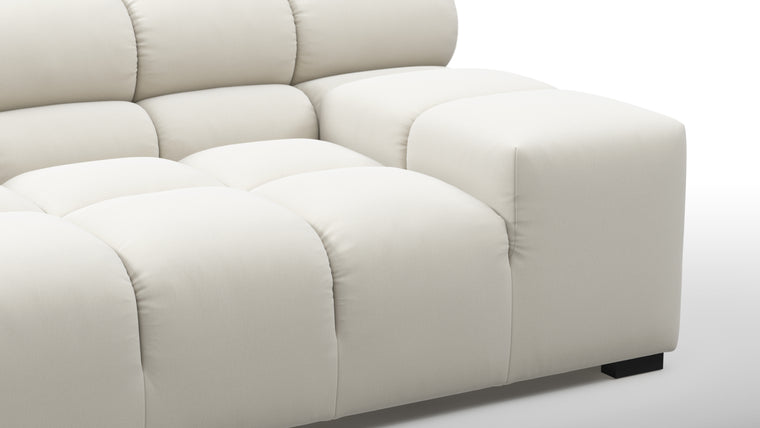 SUPERIOR COMFORT | Designed with the easy-going, informal ethos of the 1970s in mind, the Tufted modules are generously proportioned, coming together in a bench-like base with barely-there connections, allowing plenty of room for you to lean back and curl up in comfort.
