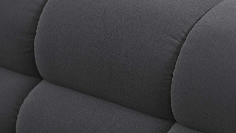 SUPERIOR COMFORT | Designed with the easy-going, informal ethos of the 1970s in mind, the Tufted modules are generously proportioned, coming together in a bench-like base with barely-there connections, allowing plenty of room for you to lean back and curl up in comfort.
