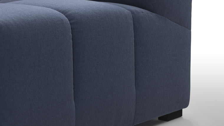 SUPERIOR COMFORT | Designed with the easy-going, informal ethos of the 1970s in mind, the Tufted modules are generously proportioned, coming together in a bench-like base with barely-there connections, allowing plenty of room for you to lean back and curl up in comfort.
