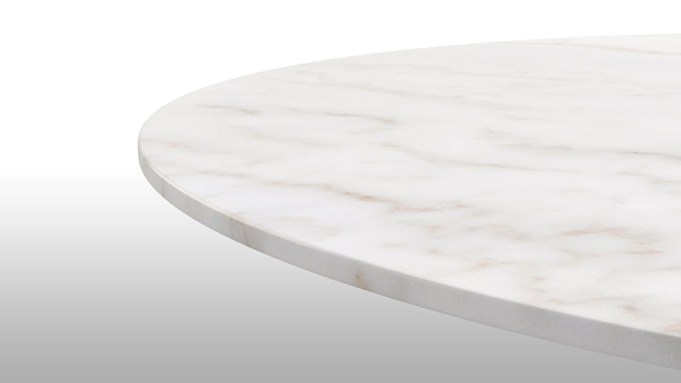 MARVELOUS MARBLE | This stylish iteration of the Aarhus Dining Table is handcrafted from only the finest materials, including a stunning white marble tabletop that’s just as beautiful as it is functional.
