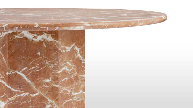 MARBLE MASTERPIECE | Made from honed natural Italian marble, this beautiful modern table makes a stunning centrepiece. Its simple, striking form pays homage to this luxurious material, accentuating the distinctive texture and patina.
