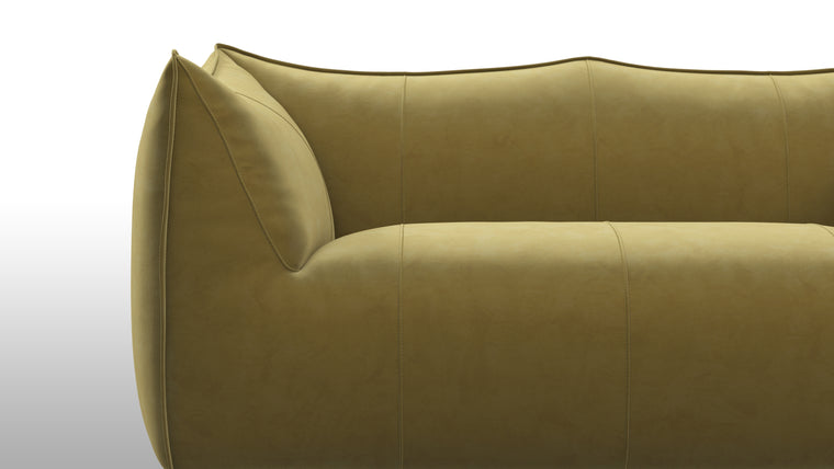 Cozy Comfort | Comfort is not compromised in the Leandro Sofa. Sink into its plush cushions and feel a sense of relaxation wash over you. The ergonomic design cradles your body, offering a cozy and supportive seating experience. Whether you're curling up with a book or enjoying a moment of solitude, this sofa envelops you in a world of comfort and tranquility.
