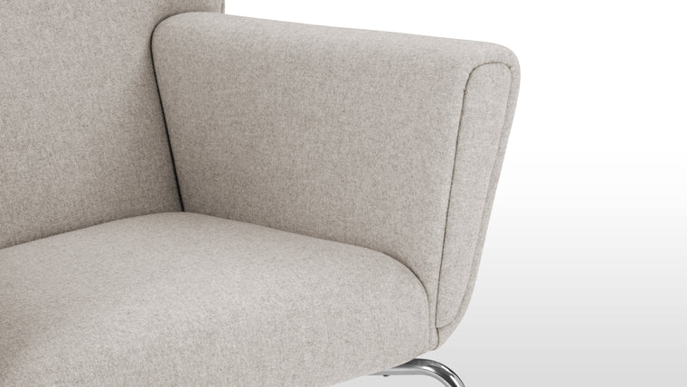 Relaxation Haven | Designed for comfort and relaxation, this chair provides exceptional support for reclining, especially with its matching ottoman. The high back and ergonomic angles make it perfect for lounging, blending function with timeless design.
