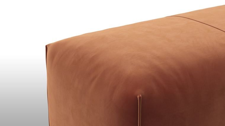 Cozy Comfort | Comfort is not compromised in the Leandro Ottoman. Sink into its plush cushions and feel a sense of relaxation wash over you. The ergonomic design allows for a truly supportive seating experience. Whether you're curling up with a book or enjoying a moment of solitude, this ottoman envelops you in a world of comfort and tranquility.
