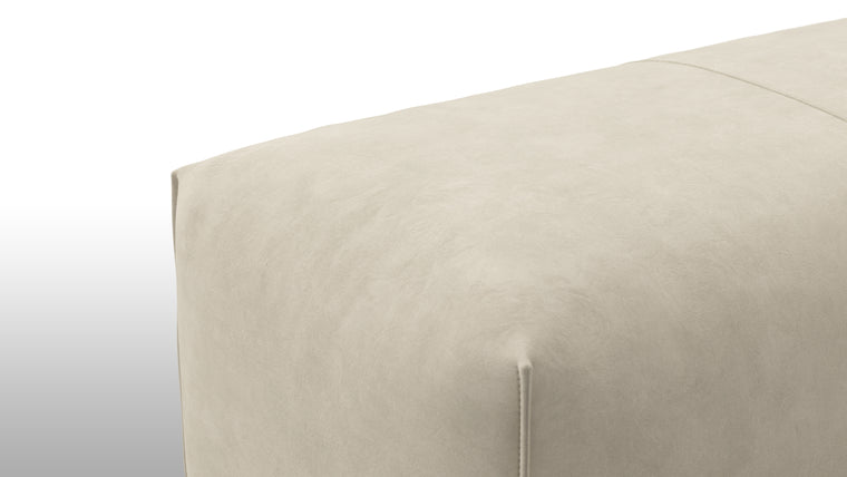 Cozy Comfort | Comfort is not compromised in the Leandro Ottoman. Sink into its plush cushions and feel a sense of relaxation wash over you. The ergonomic design allows for a truly supportive seating experience. Whether you're curling up with a book or enjoying a moment of solitude, this ottoman envelops you in a world of comfort and tranquility.
