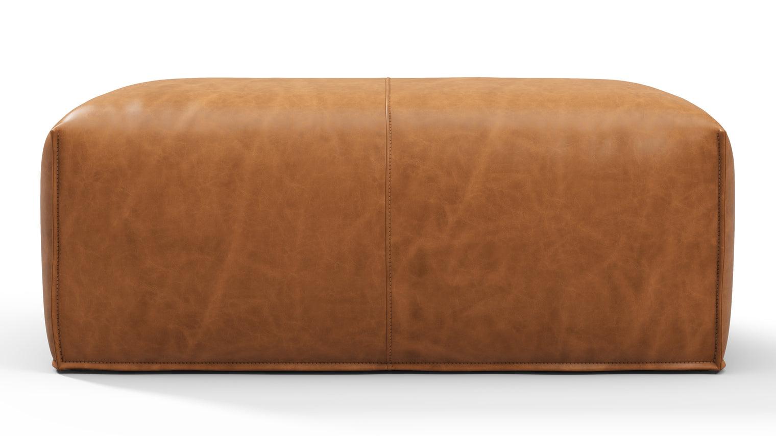 SCULPTURAL EXCELLENCE | Crafted with the utmost attention to detail, this ottoman showcases exceptional craftsmanship and luxurious materials. The upholstery adds a touch of elegance and texture, with the carefully tailored contours and seamless stitching exemplifying the dedication to perfection that defines products from Interior Icons.
