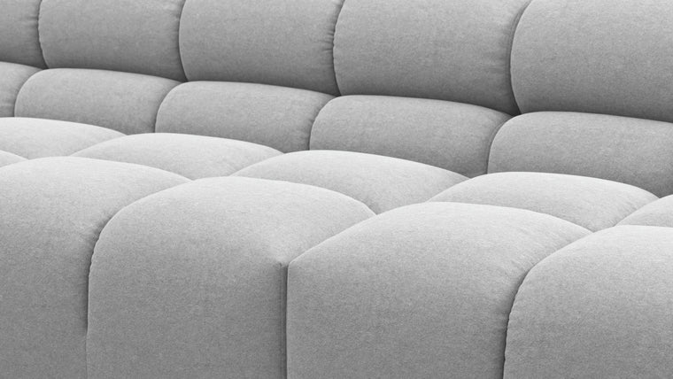 SUPERIOR COMFORT | Designed with the easy-going, informal ethos of the 1970s in mind, the Tufted modules are generously proportioned, coming together in a bench-like base with barely-there connections, allowing plenty of room for you to lean back and curl up in comfort.
