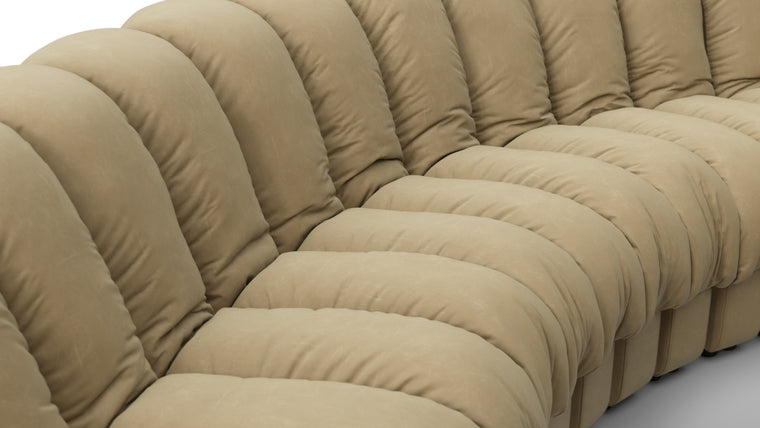 Sculptural Seating | Crafted with uncompromising attention to detail, the DS 600 Sofa showcases exceptional craftsmanship and luxurious materials. The plush upholstery, available in an array of fabrics from premium vegan leather to boucle, envelops you in unparalleled comfort. The elegant stitching and meticulous finishes reflect a dedication to quality and design integrity.
