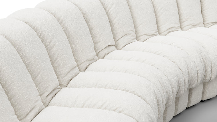 Sculptural Seating | Crafted with uncompromising attention to detail, the DS 600 Sofa showcases exceptional craftsmanship and luxurious materials. The plush upholstery, available in an array of fabrics from premium vegan leather to boucle, envelops you in unparalleled comfort. The elegant stitching and meticulous finishes reflect a dedication to quality and design integrity.
