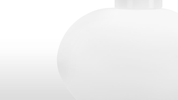 Modern Elegance | Featuring an asymmetrical, pebble-like glass shade, the Arran Flushmount blends artistry with simplicity. The frosted or opal glass softens the light, enhancing the modern yet cozy aesthetic.
