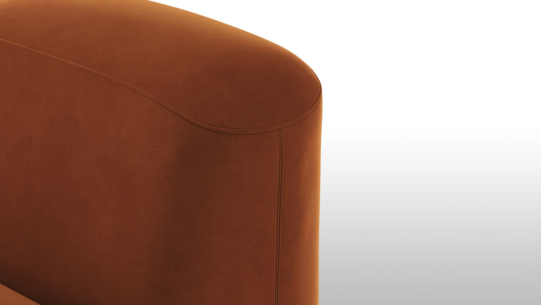 Warm Minimalism | Minimalist yet striking, the modules feature soft velvet upholstery, chunky arms, rounded edges, and detailed stitchwork for tactile and visual intrigue. The burnt orange hue adds a touch of warmth and timeless sophistication.
