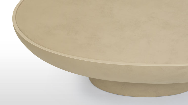 Concrete Couture | Constructed from high-quality concrete, the Aura Coffee Table is not only aesthetically pleasing but also robust and long-lasting. The material's natural texture and subtle variations in color give each table a one-of-a-kind character, ensuring that no two tables are exactly alike.
