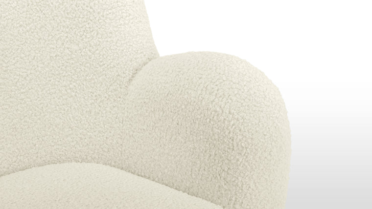 Comfort in Every Curve | Generously cushioned and thoughtfully contoured, the Flemming invites you to settle in. Its deep seat and supportive back make it ideal for lounging without sacrificing posture.
