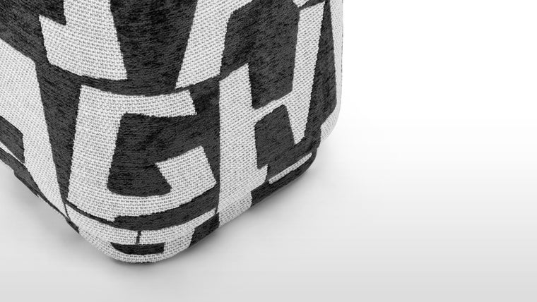 Versatile & Stylish | Whether used as a footstool, extra seat, or a bold décor piece, the Astratto Ottoman enhances any room. Its compact size makes it ideal for small spaces, while the recessed base gives it a subtle floating effect.
