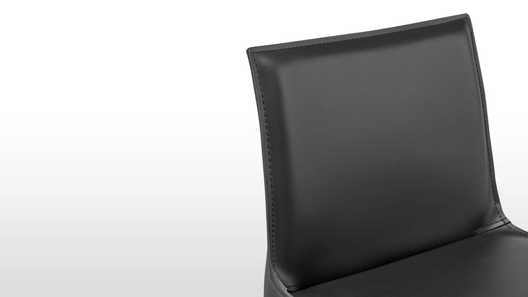 Premium Leather Upholstery | Enjoy the supple feel and enduring quality of top-grade leather that covers every inch of the stool, from seat to legs.
